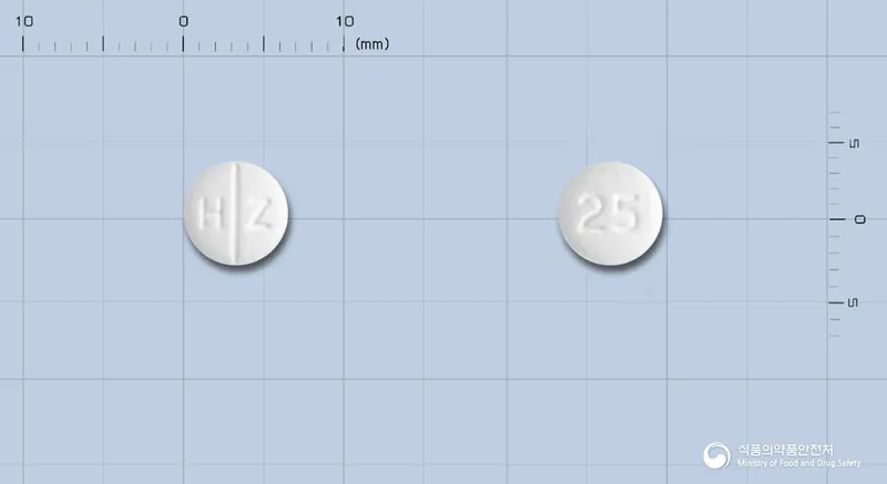 토피메정25밀리그램(토피라메이트) 앞뒤 사진 (흰색 원형, 각인 H Z / 25)