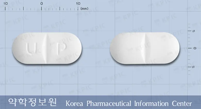 유니콜론정 앞뒤 사진 (흰색 장방형, 각인 U P)
