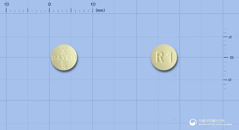 아뎀파스정1밀리그램(리오시구앗) 앞뒤 사진 (노란색 원형, 각인 R 1)