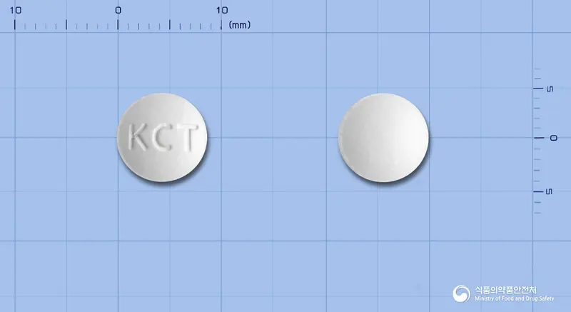 코프심정(세프포독심프록세틸) 앞뒤 사진 (흰색 원형, 각인 KCT)