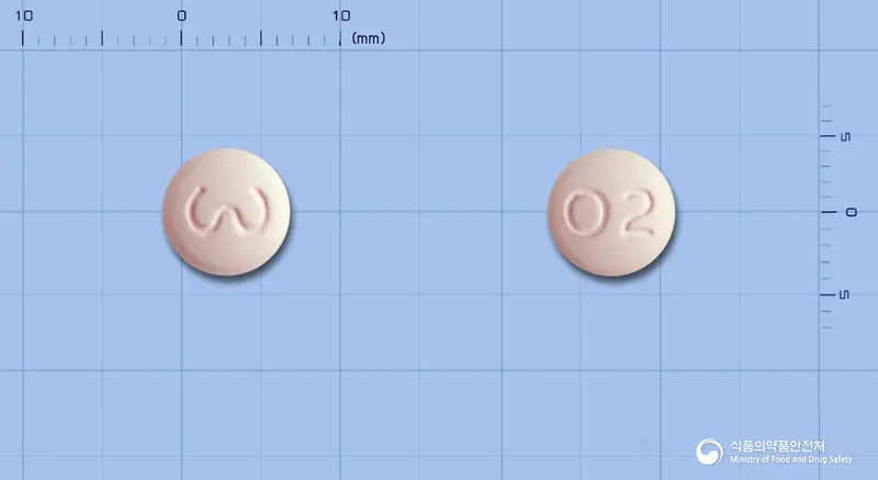 솔리신정10mg(솔리페나신숙신산염) 앞뒤 사진 (분홍색 원형, 각인 02)
