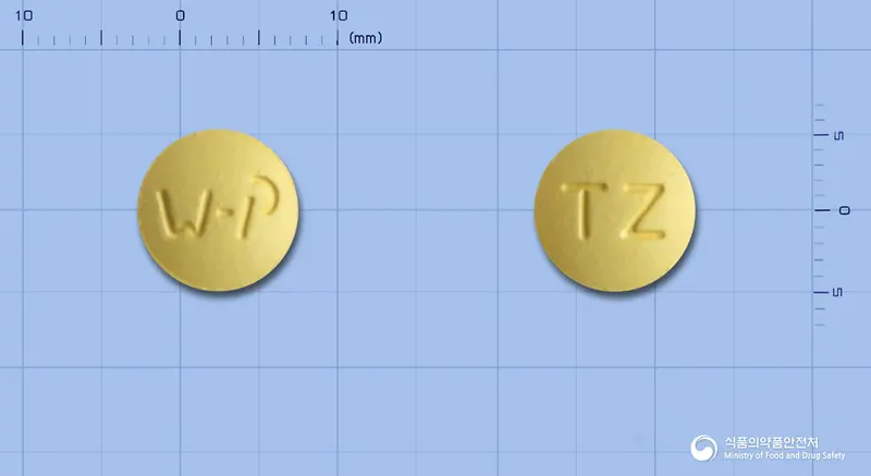 니자액스정150밀리그램(니자티딘)(수출용) 앞뒤 사진 (노란색 원형, 각인 TZ)