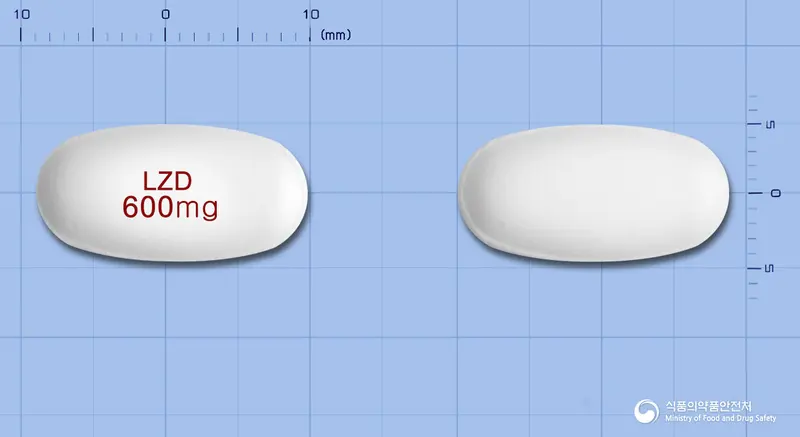 리조리드정600밀리그램(리네졸리드) 앞뒤 사진 (흰색 타원형, 각인 LZD600mg)
