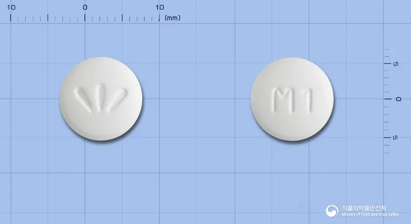 다이포민정500밀리그램(메트포르민염산염) 앞뒤 사진 (흰색 원형, 각인 M1)