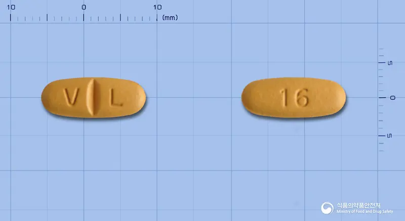 발데리드정160mg(발사르탄) 앞뒤 사진 (갈색 타원형, 각인 V L / 16)