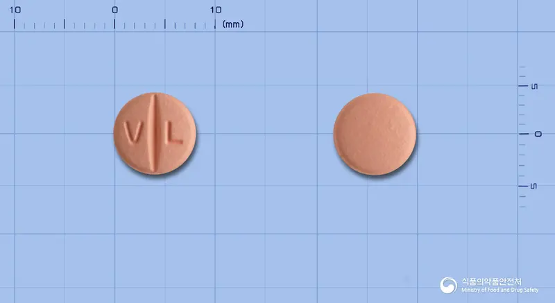 발데리드정80mg(발사르탄) 앞뒤 사진 (분홍색 원형, 각인 V L)