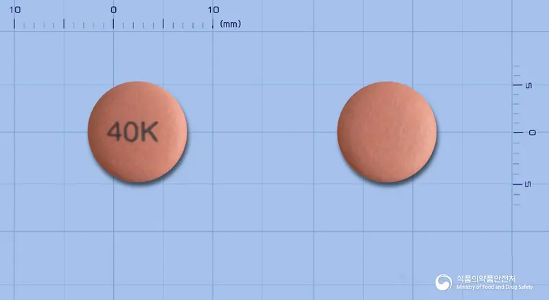 엑시피움정40mg(에스오메프라졸마그네슘삼수화물) 앞뒤 사진 (분홍색 원형, 각인 40K)