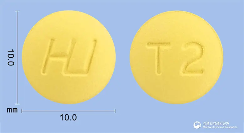 휴자틴정150mg(니자티딘) 앞뒤 사진 (노란색 원형, 각인 T2)