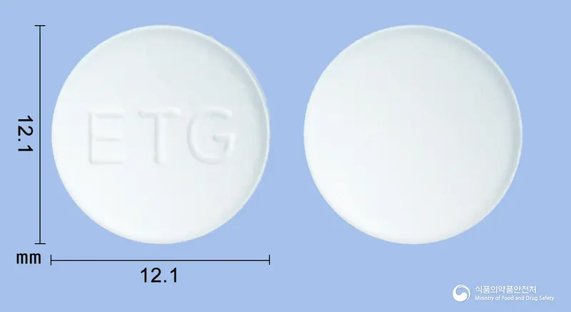 알마노겐정(알마게이트) 앞뒤 사진 (흰색 원형, 각인 ETG)