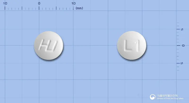 휴로피진정(레보드로프로피진) 앞뒤 사진 (흰색 원형, 각인 L1)