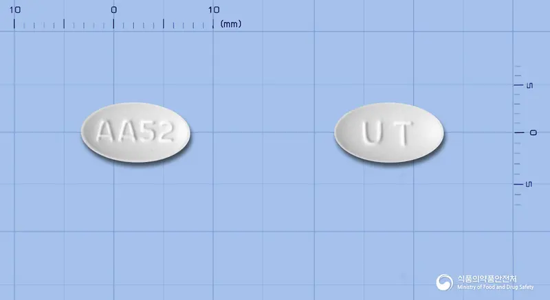 뉴펙스듀오정5mg/20mg 앞뒤 사진 (흰색 타원형, 각인 AA52 / UT)