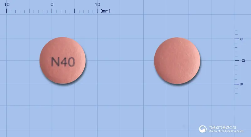 넥스졸정40mg(에스오메프라졸마그네슘삼수화물) 앞뒤 사진 (분홍색 원형, 각인 N40)
