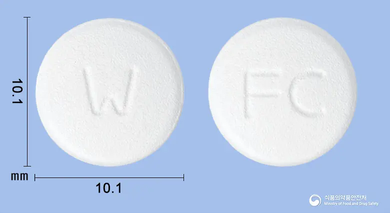 팜시스정250mg(팜시클로비르) 앞뒤 사진 (흰색 원형, 각인 W / FC)