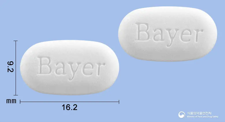 사리돈에스정 앞뒤 사진 (흰색 타원형, 각인 Bayer / Bayer)