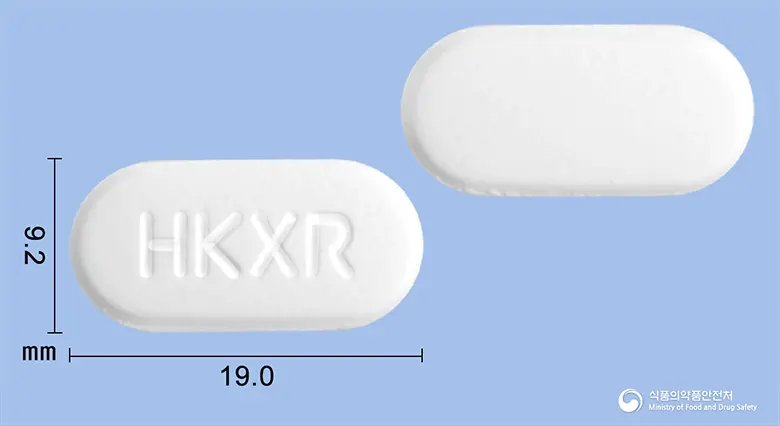 에이폴민서방정(메트포르민염산염) 앞뒤 사진 (흰색 장방형, 각인 HK XR)