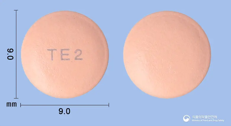 넥스온정20mg (에스오메프라졸마그네슘삼수화물) 앞뒤 사진 (분홍색 원형, 각인 TE2)