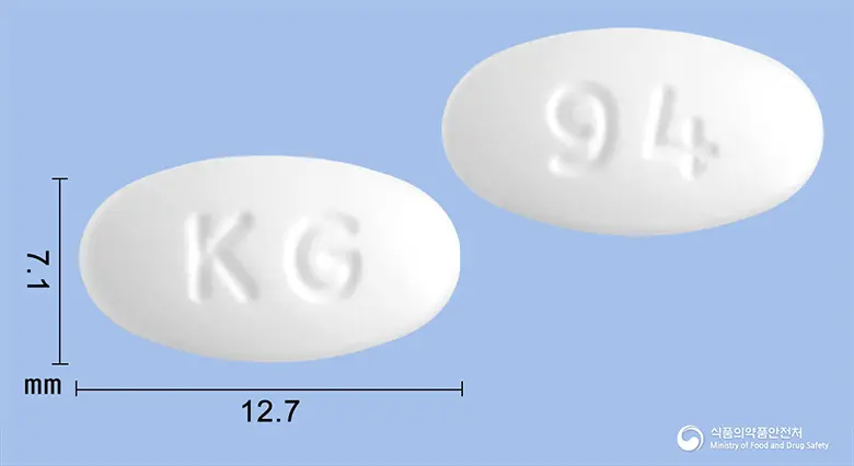 포사론정(알렌드론산나트륨수화물) 앞뒤 사진 (흰색 타원형, 각인 KG / 94)