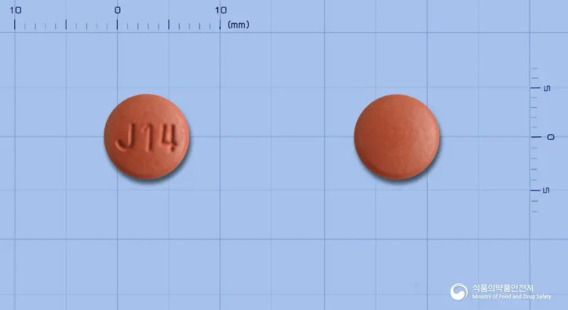 제이비카정10/40mg 앞뒤 사진 (갈색 원형, 각인 J14)
