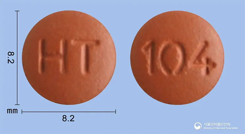 아몰비카정10/40mg 앞뒤 사진 (갈색 원형, 각인 HT / 104)