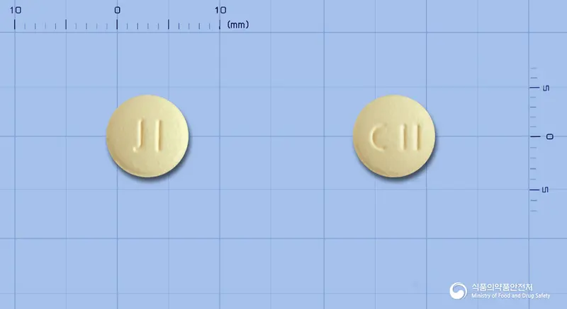 세비듀오정5/40밀리그램 앞뒤 사진 (노란색 원형, 각인 JI / CII)