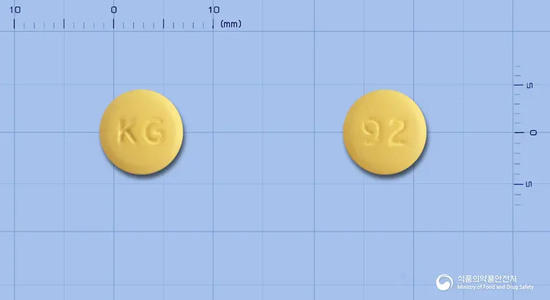 글로포지정5/80밀리그램 앞뒤 사진 (노란색 원형, 각인 KG / 92)