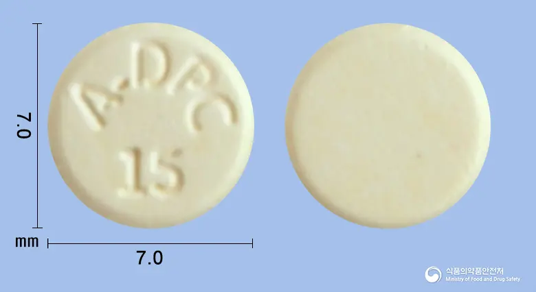 동광아리피프라졸정15mg 앞뒤 사진 (노란색 원형, 각인 A-DPC 15)
