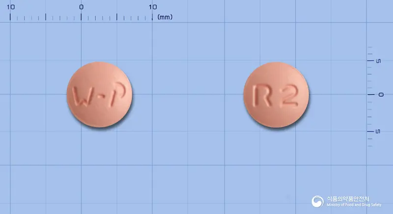 콜레스톱정20밀리그램(로수바스타틴칼슘) 앞뒤 사진 (분홍색 원형, 각인 R2)