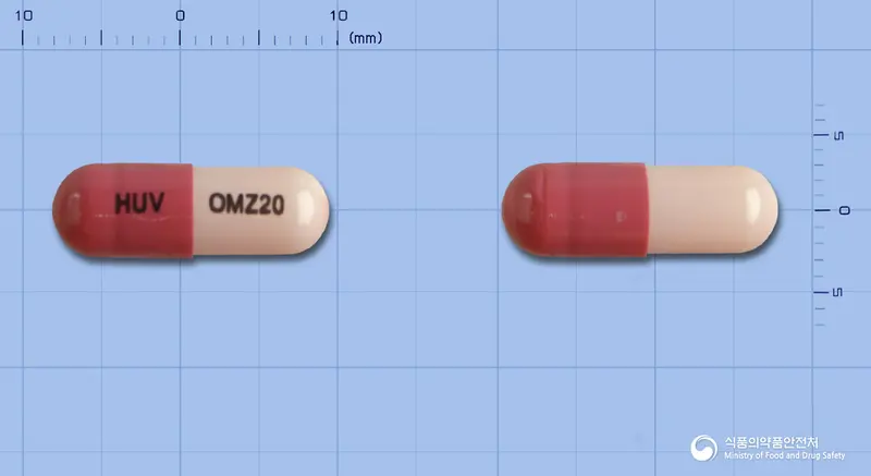오메졸캡슐(오메프라졸) 앞뒤 사진 (빨간색 캡슐, 각인 HUV OMZ20)