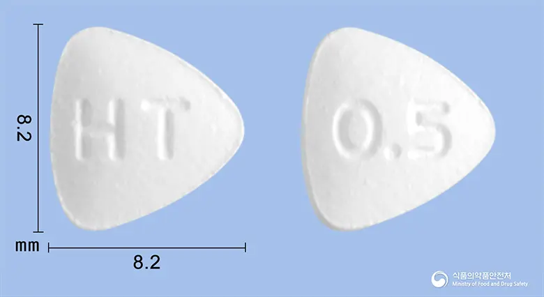 엔비어정0.5mg(엔테카비르) 앞뒤 사진 (흰색 삼각형, 각인 HT / 0.5)