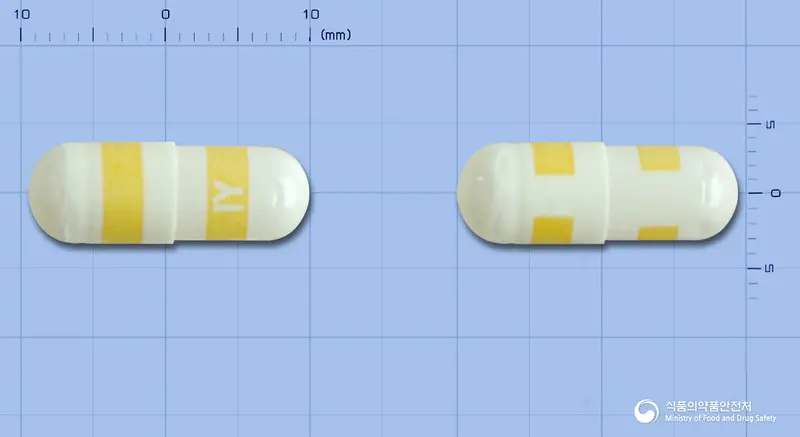 투콕시브캡슐200mg(세레콕시브) 앞뒤 사진 (흰색 캡슐, 각인 IY)