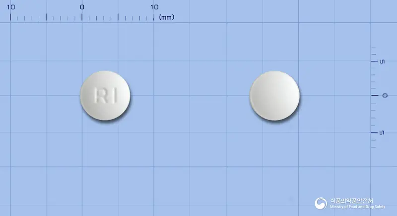 리마프정(리마프로스트알파덱스) 앞뒤 사진 (흰색 원형, 각인 RI)