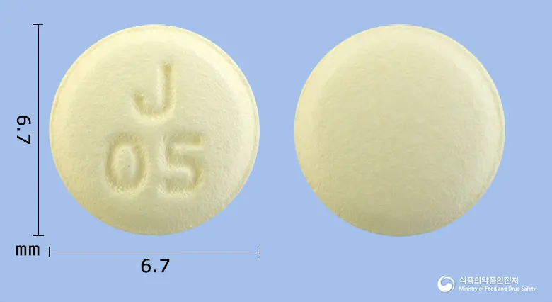 솔리페나정5mg(솔리페나신숙신산염) 앞뒤 사진 (노란색 원형, 각인 J05)