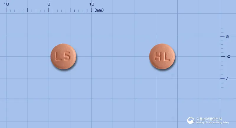 로디비카정5/20밀리그램(에스암로디핀니코틴산염, 올메사탄메독소밀) 앞뒤 사진 (분홍색 원형, 각인 L5 / HL)