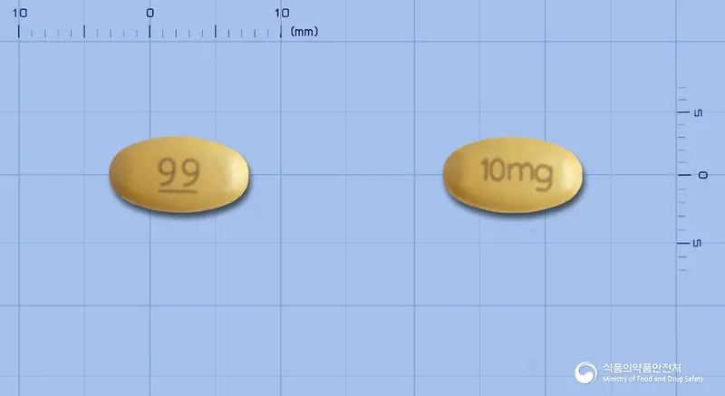 구구정10밀리그램(타다라필) 앞뒤 사진 (주황색 타원형, 각인 99-- / 10mg)