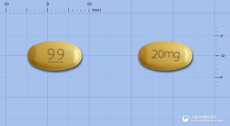 구구정20밀리그램(타다라필) 앞뒤 사진 (주황색 타원형, 각인 99-- / 20mg)
