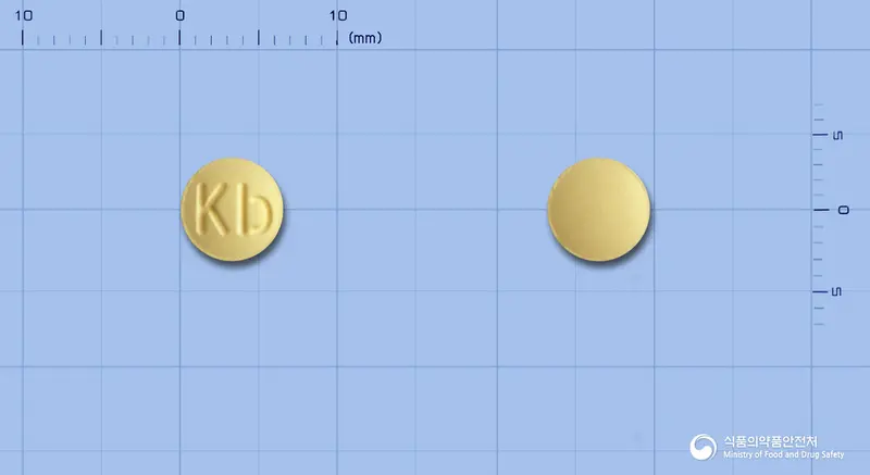 아제라틴정(아젤라스틴염산염) 앞뒤 사진 (노란색 원형, 각인 Kb)