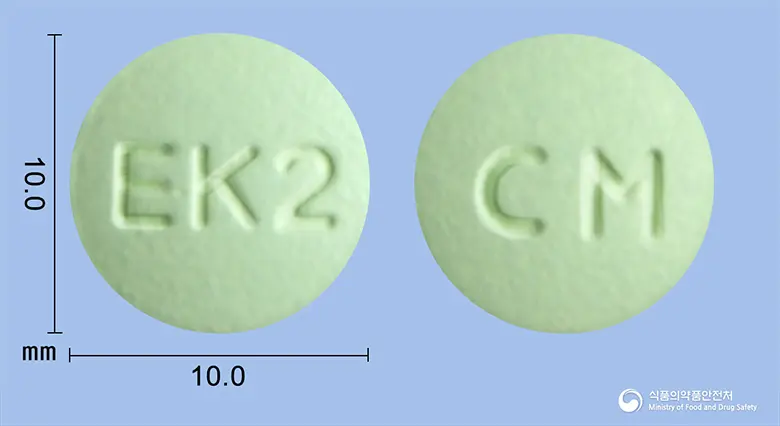 시메텐정(시메티딘) 앞뒤 사진 (연두색 원형, 각인 EK2 / CM)