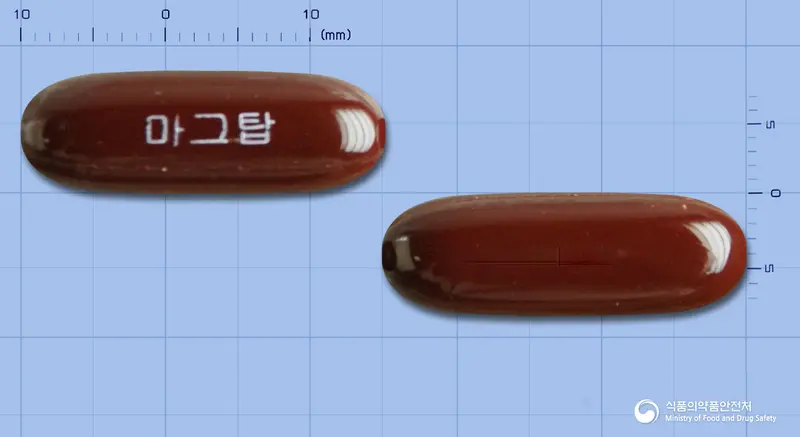 마그탑연질캡슐 앞뒤 사진 (갈색 캡슐, 각인 마그탑)