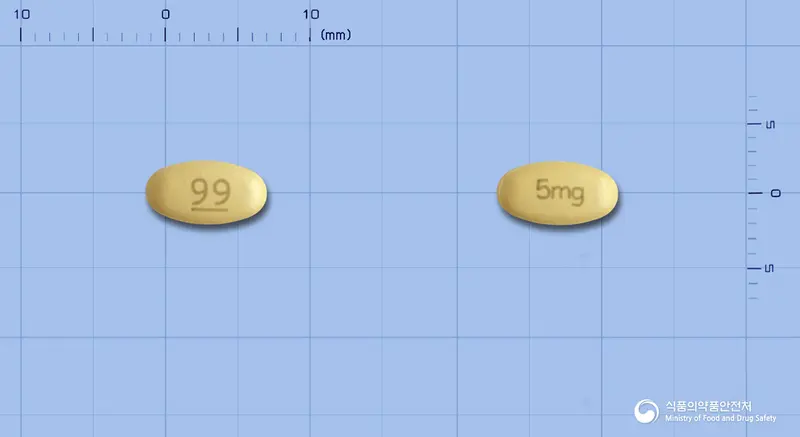 구구정5밀리그램(타다라필) 앞뒤 사진 (노란색 타원형, 각인 99-- / 5mg)