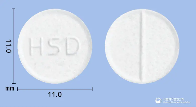 도베라정(도베실산칼슘수화물) 앞뒤 사진 (흰색 원형, 각인 HSD)