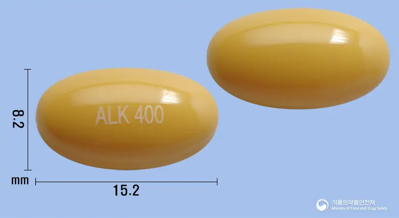 콜린알포젠연질캡슐(콜린알포세레이트) 앞뒤 사진 (갈색 캡슐, 각인 ALK 400)