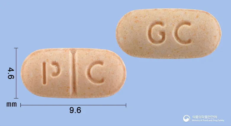 네오칸데플러스정 앞뒤 사진 (주황색 타원형, 각인 P C / GC)