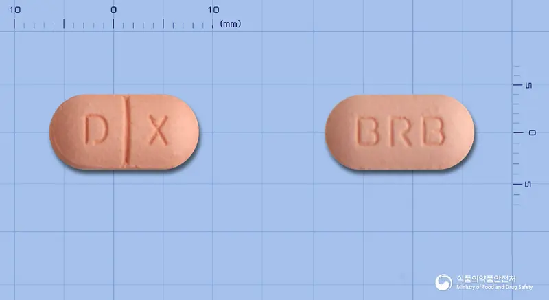 비알덱시펜정(덱시부프로펜디.씨) 앞뒤 사진 (분홍색 장방형, 각인 D X / BRB)