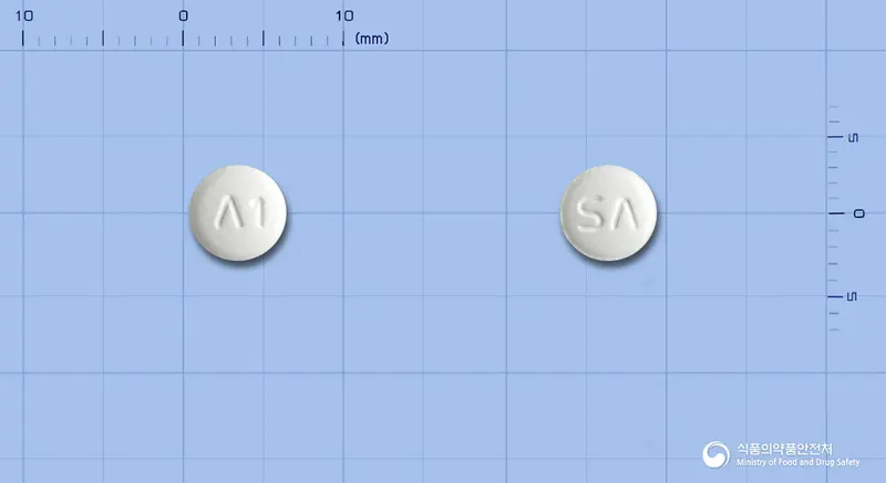 두비카정5/20mg 앞뒤 사진 (흰색 원형, 각인 Λ1 / SΛ)