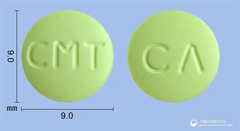 시메티드정(시메티딘) 앞뒤 사진 (연두색 원형, 각인 CMT / CΛ)