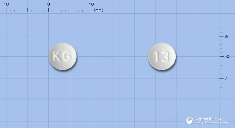 리마프리정(리마프로스트알파덱스) 앞뒤 사진 (흰색 원형, 각인 KG / 13)