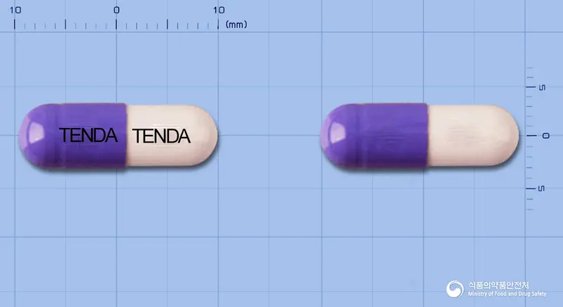 텐다나민캡슐 앞뒤 사진 (보라색 캡슐, 각인 TENDA TENDA)