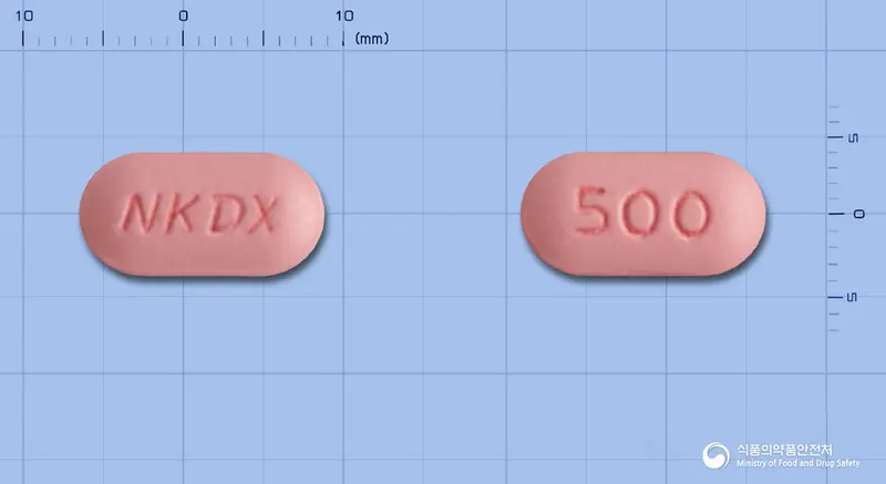이펜알정(이부프로펜아르기닌) 앞뒤 사진 (분홍색 장방형, 각인 NKDX / 500)