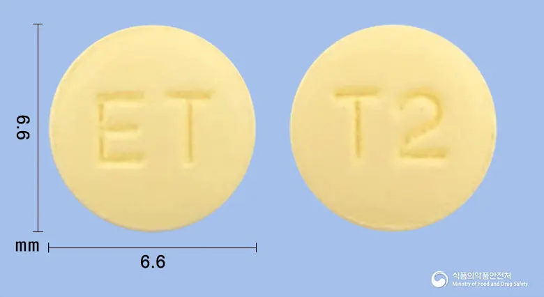 유리페나정5mg(솔리페나신숙신산염) 앞뒤 사진 (노란색 원형, 각인 ET / T2)