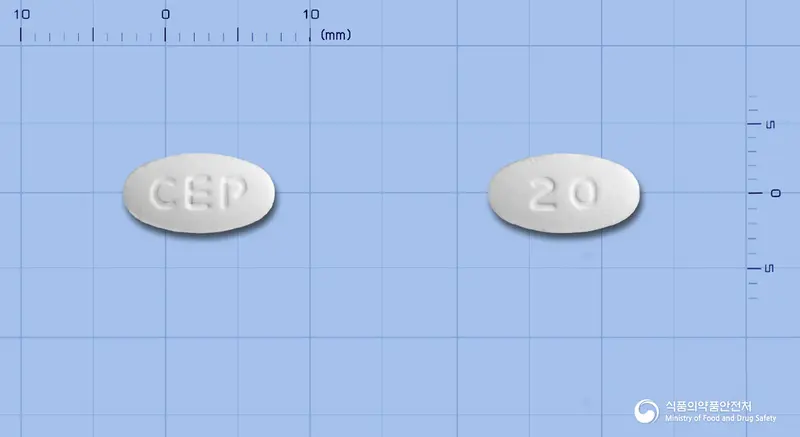 셀티스셀자탄정(로사르탄칼륨) 앞뒤 사진 (흰색 타원형, 각인 CEP / 20)